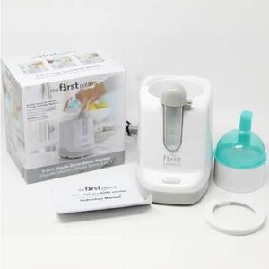 The first Years Baby Bottle Warmer in Box